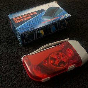 Red Hand-Pressing Flashlight